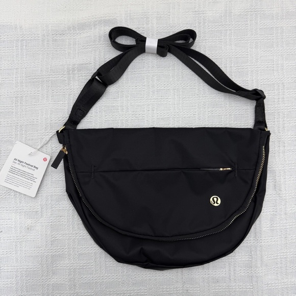 lululemon athletica Handbags - Lululemon athletica Festival Bag 5L • Black/Gold • New